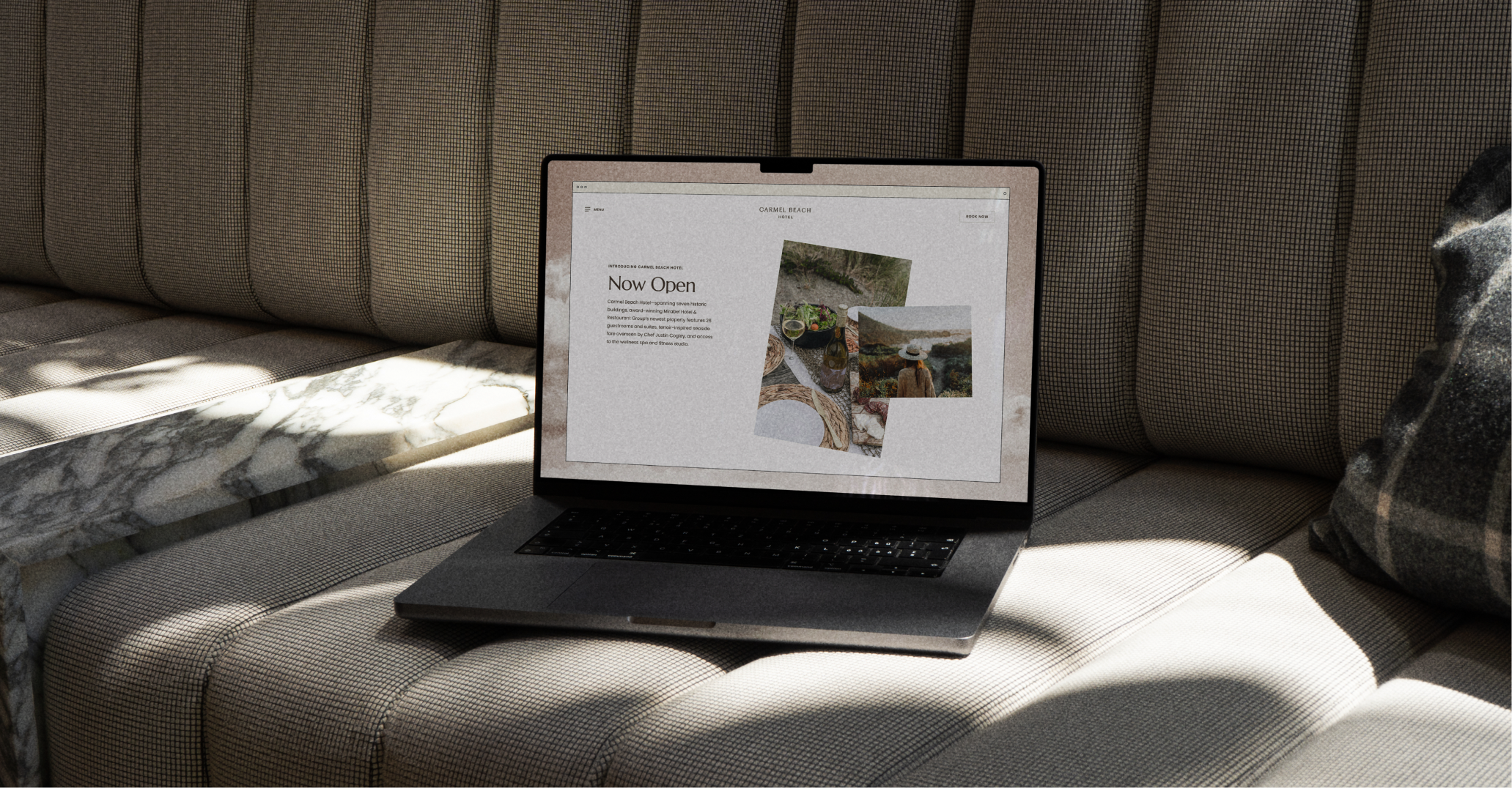 Carmel Beach Hotel — website on laptop