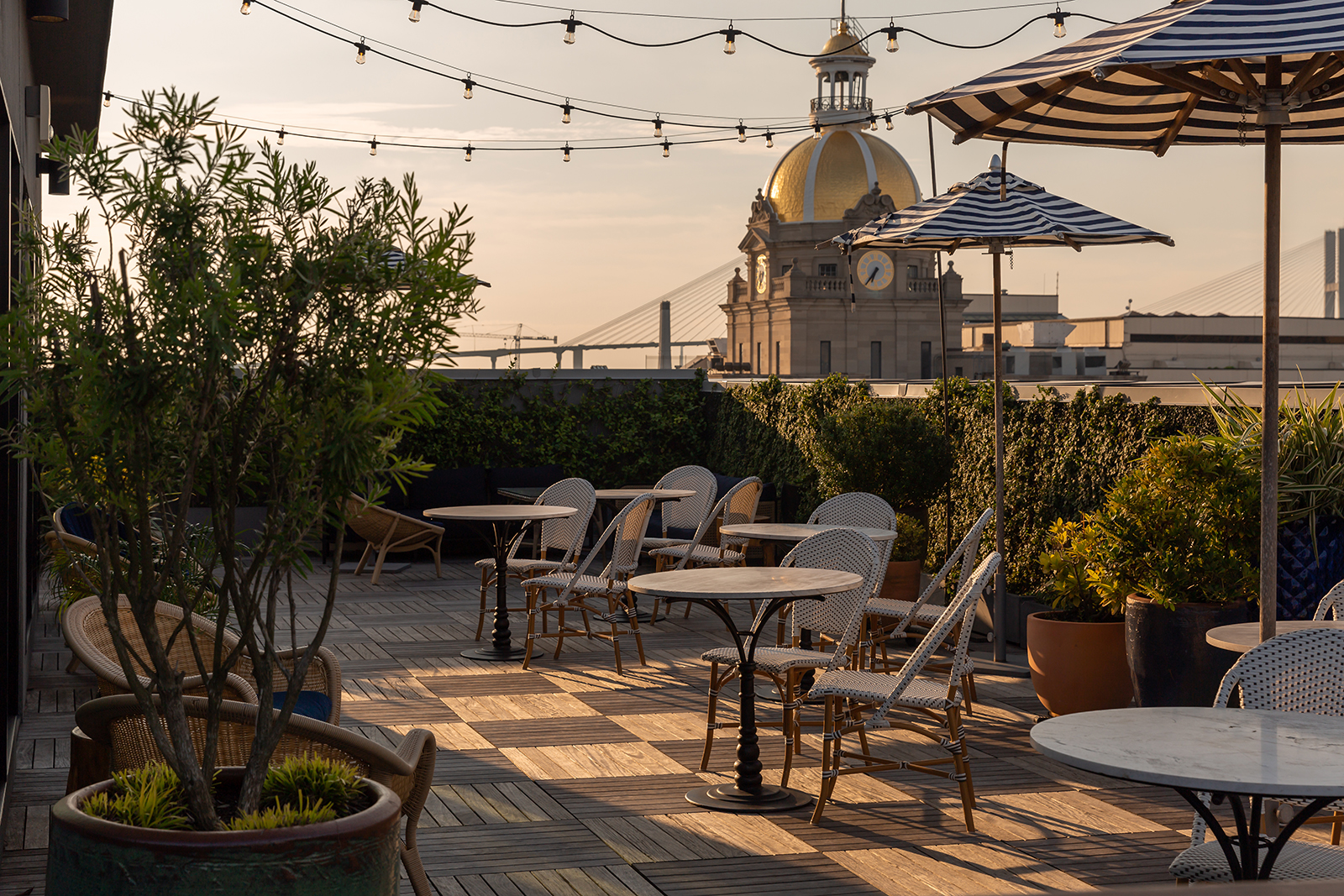 Pendant Penthouse rooftop at sunset